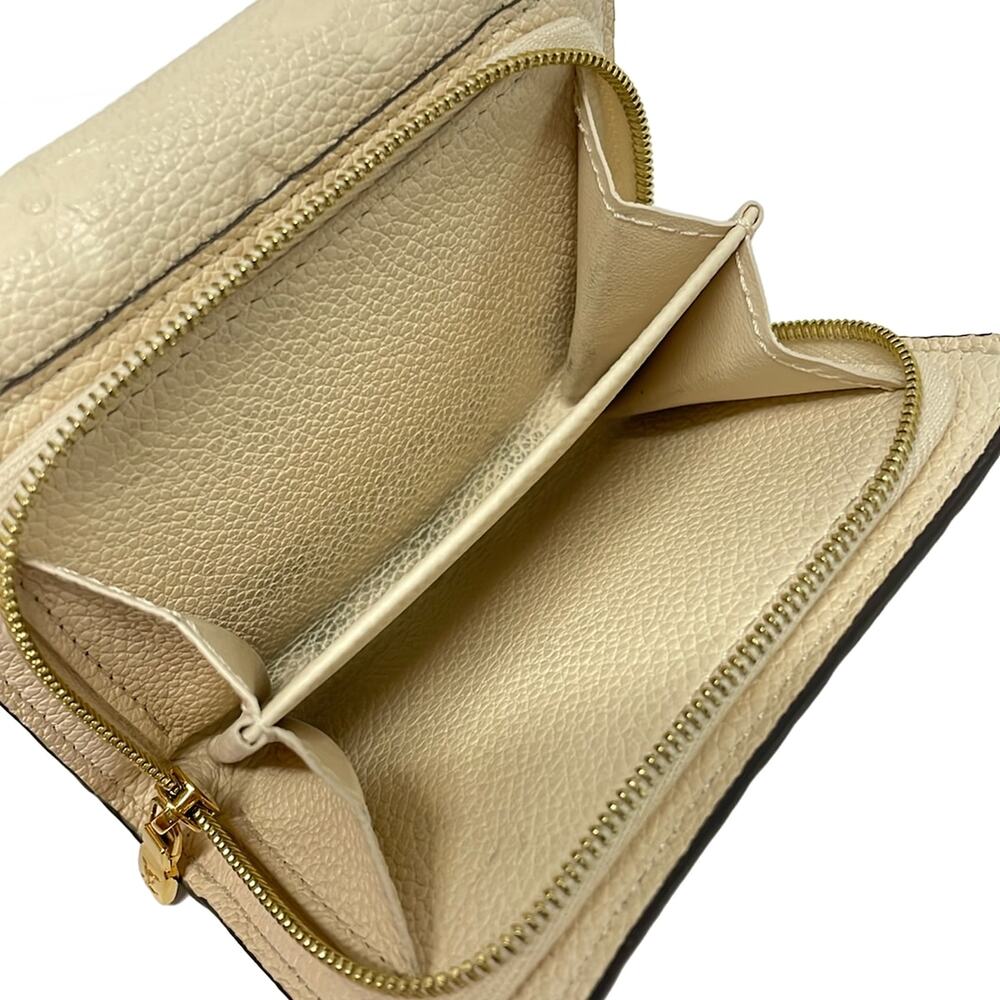 Louis Vuitton Portefeuille Metis Compact Monogram Empreinte Trifold Wallet - Picture 4 of 6